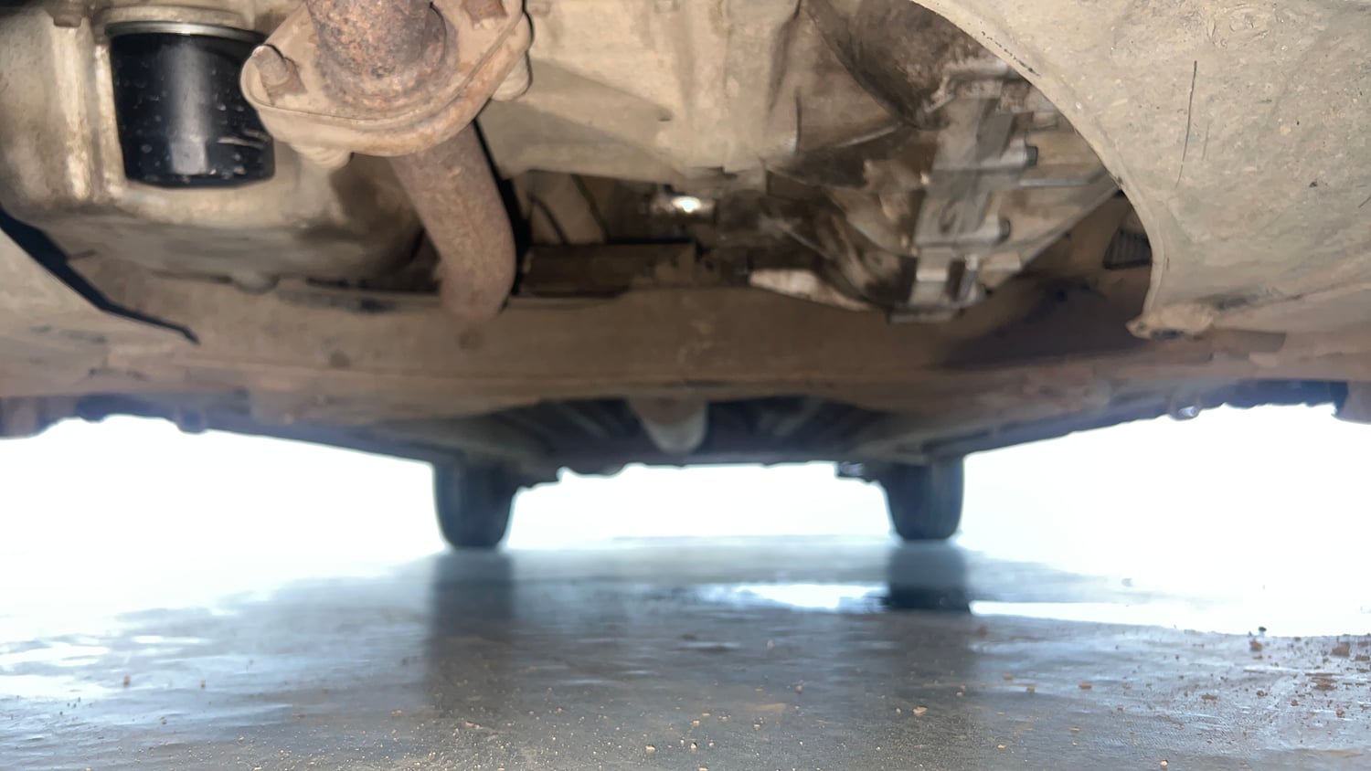 Used 2013 Maruti Suzuki Ertiga Vxi Petrol Manual extra FRONT LEFT UNDERBODY VIEW