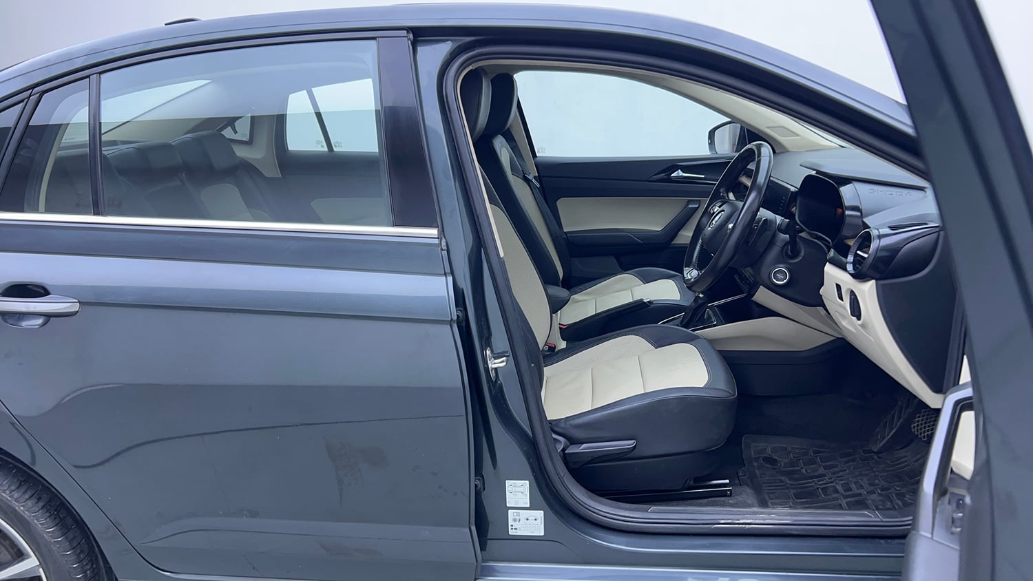 Used 2023 Skoda Slavia Style 1.0L TSI AT Petrol Automatic interior RIGHT SIDE FRONT DOOR CABIN VIEW