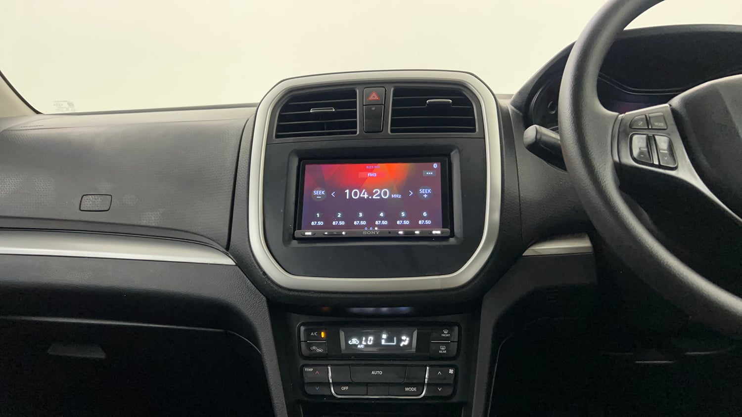 Used 2020 maruti-suzuki Vitara Brezza VXi Petrol Manual interior MUSIC SYSTEM & AC CONTROL VIEW