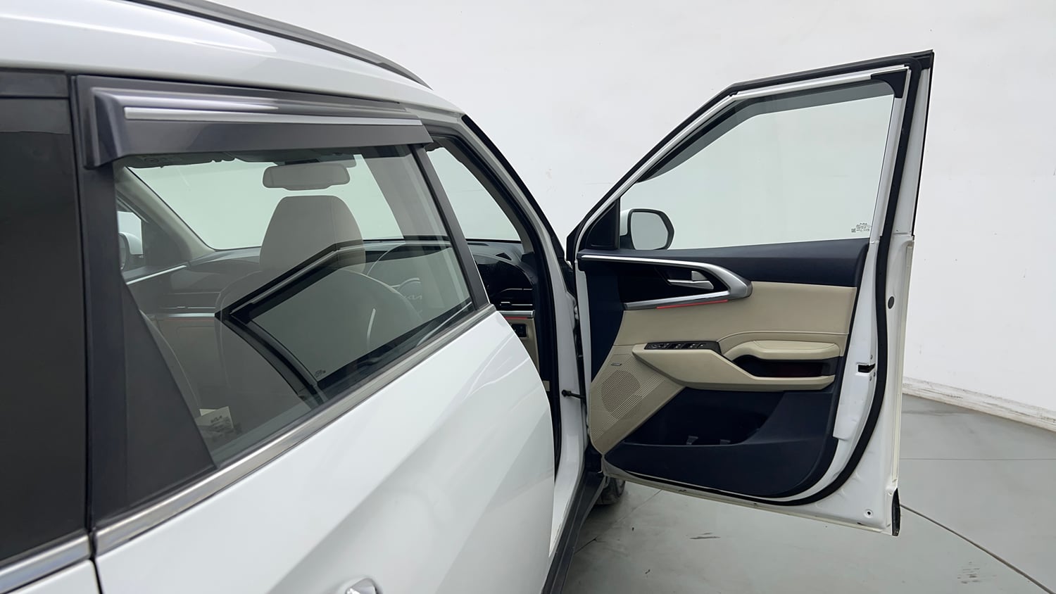 Used 2022 Kia Carens Luxury Plus 1.4 Petrol 7 STR Petrol Manual interior RIGHT FRONT DOOR OPEN VIEW