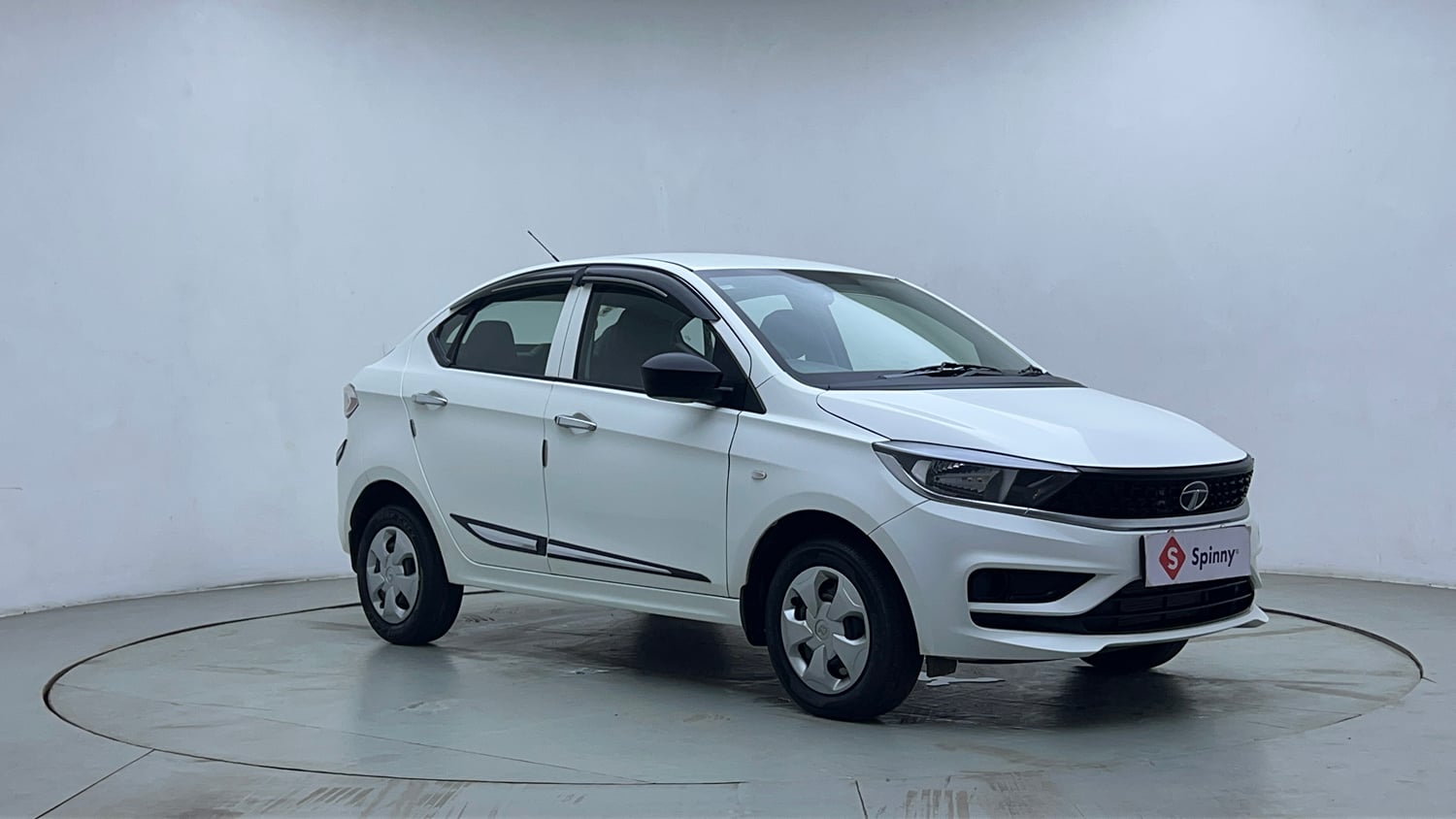 Used 2024 Tata Tigor XM Petrol Manual exterior RIGHT FRONT CORNER VIEW