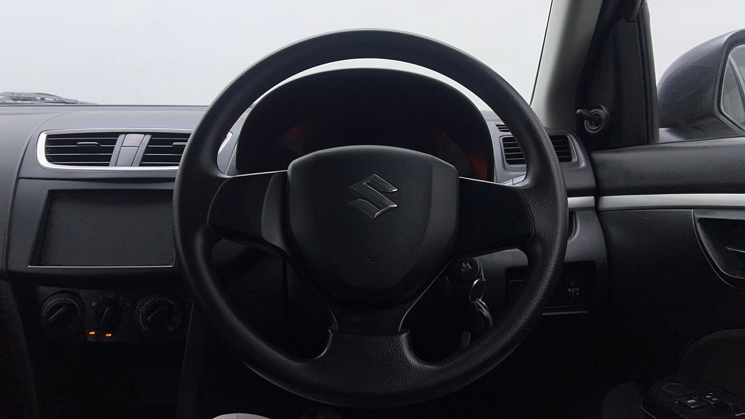 Used 2015 Maruti Suzuki Swift Lxi (O) Petrol Manual interior STEERING VIEW