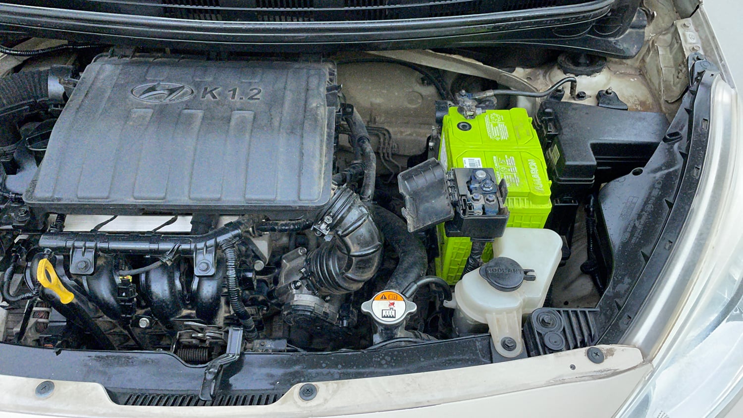 Used 2013 Hyundai Grand i10 Sportz 1.2 Kappa VTVT Petrol Manual engine ENGINE LEFT SIDE VIEW
