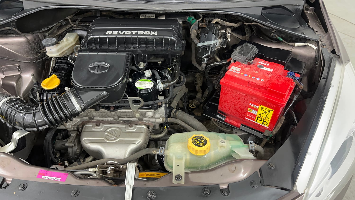 Used 2017 Tata Tiago Revotron XT Petrol Manual engine ENGINE LEFT SIDE VIEW