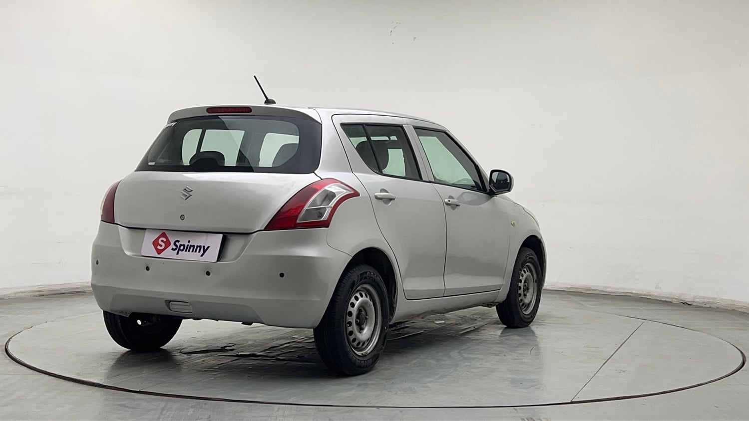 Used 2017 Maruti Suzuki Swift Lxi (O) Petrol Manual exterior RIGHT REAR CORNER VIEW