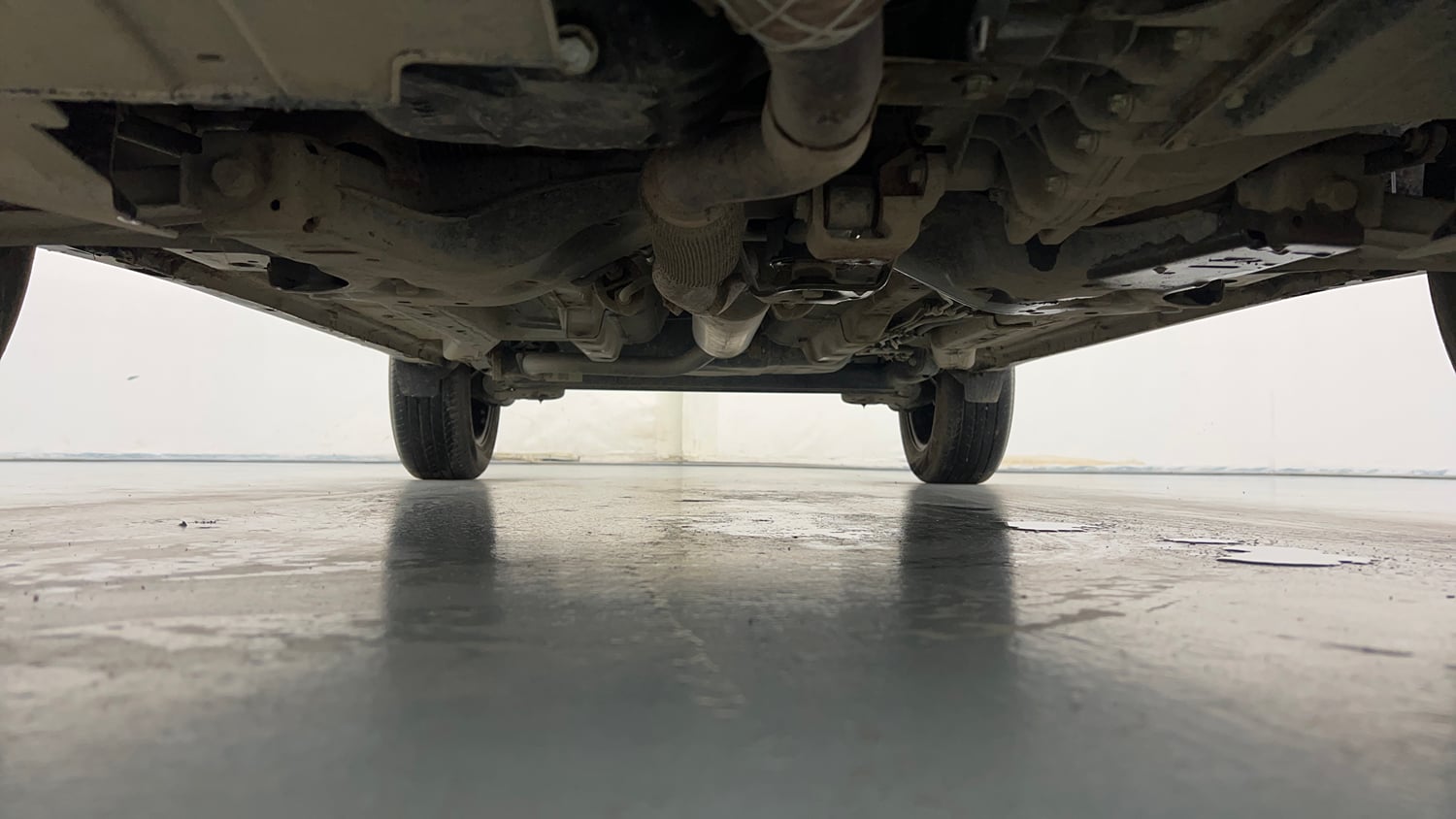 Used 2026 Tata Nexon Fearless + A PS DCA DK 1.2 Petrol Automatic extra FRONT LEFT UNDERBODY VIEW
