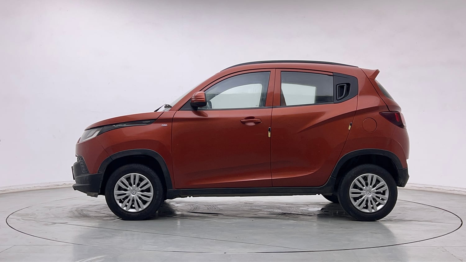 Used 2017 Mahindra KUV100 K4 6 STR Petrol Manual exterior LEFT SIDE VIEW