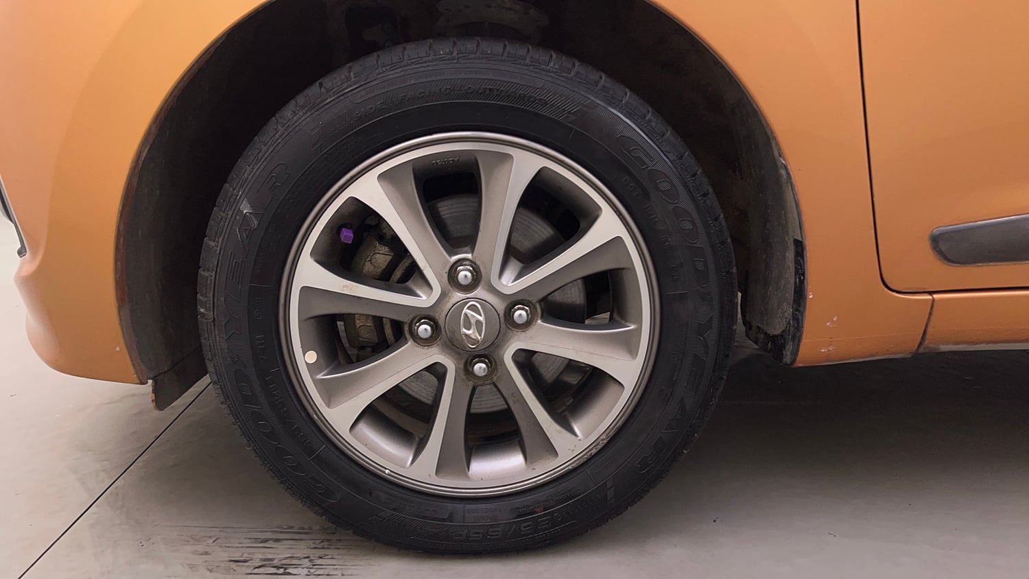 Used 2013 Hyundai Grand i10 Asta 1.2 Kappa VTVT Petrol Manual tyres LEFT FRONT TYRE RIM VIEW