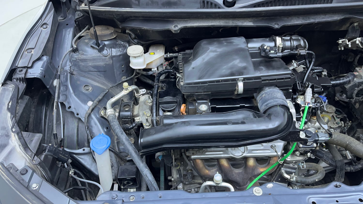Used 2024 Maruti Suzuki Baleno Delta MT Petrol Manual engine ENGINE RIGHT SIDE VIEW