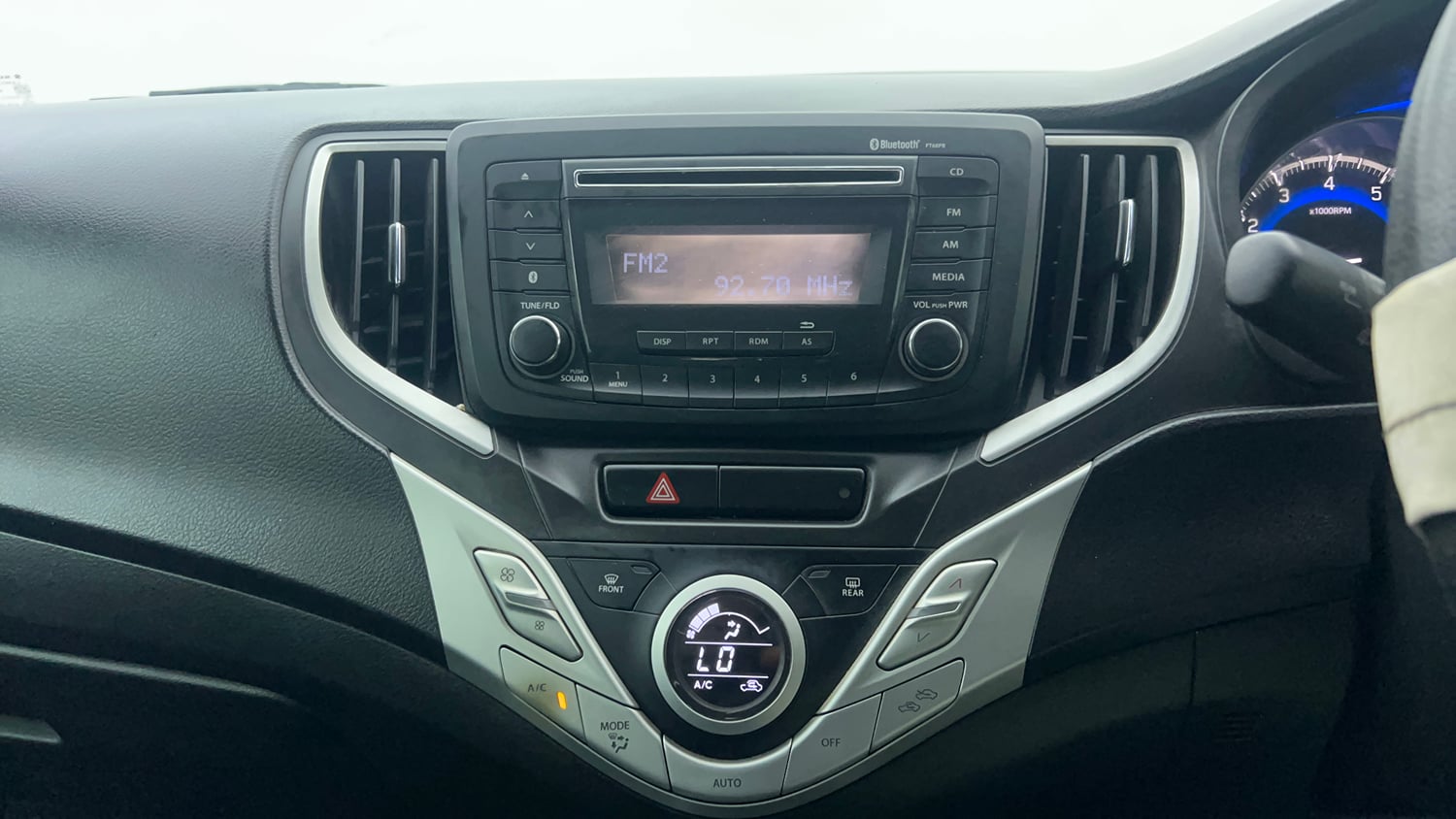 Used 2016 Maruti Suzuki Baleno Zeta 1.2 Petrol Manual interior MUSIC SYSTEM & AC CONTROL VIEW