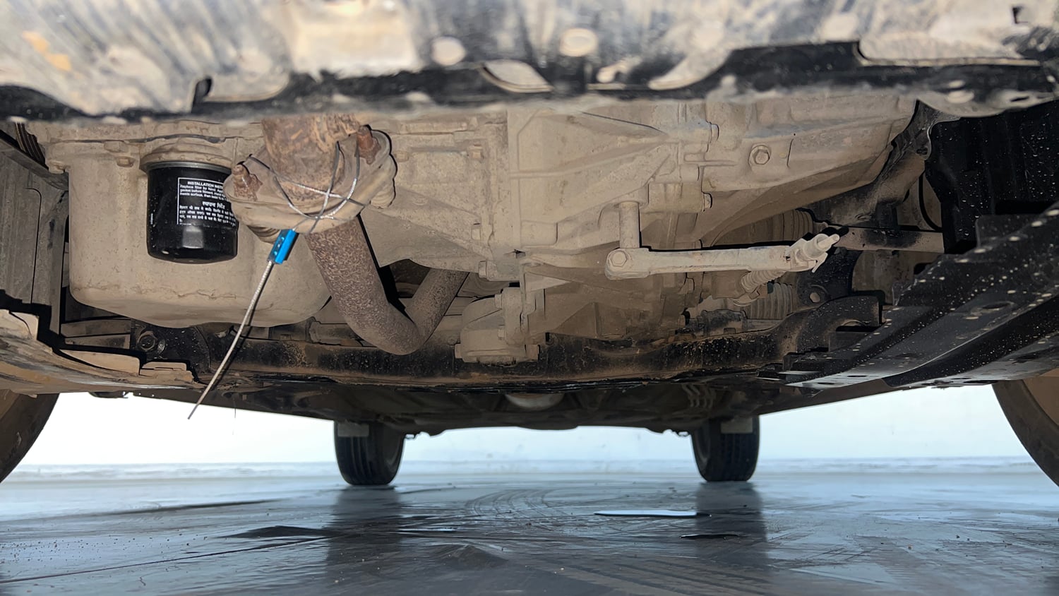 Used 2020 Maruti Suzuki Baleno Zeta Petrol Manual extra FRONT LEFT UNDERBODY VIEW