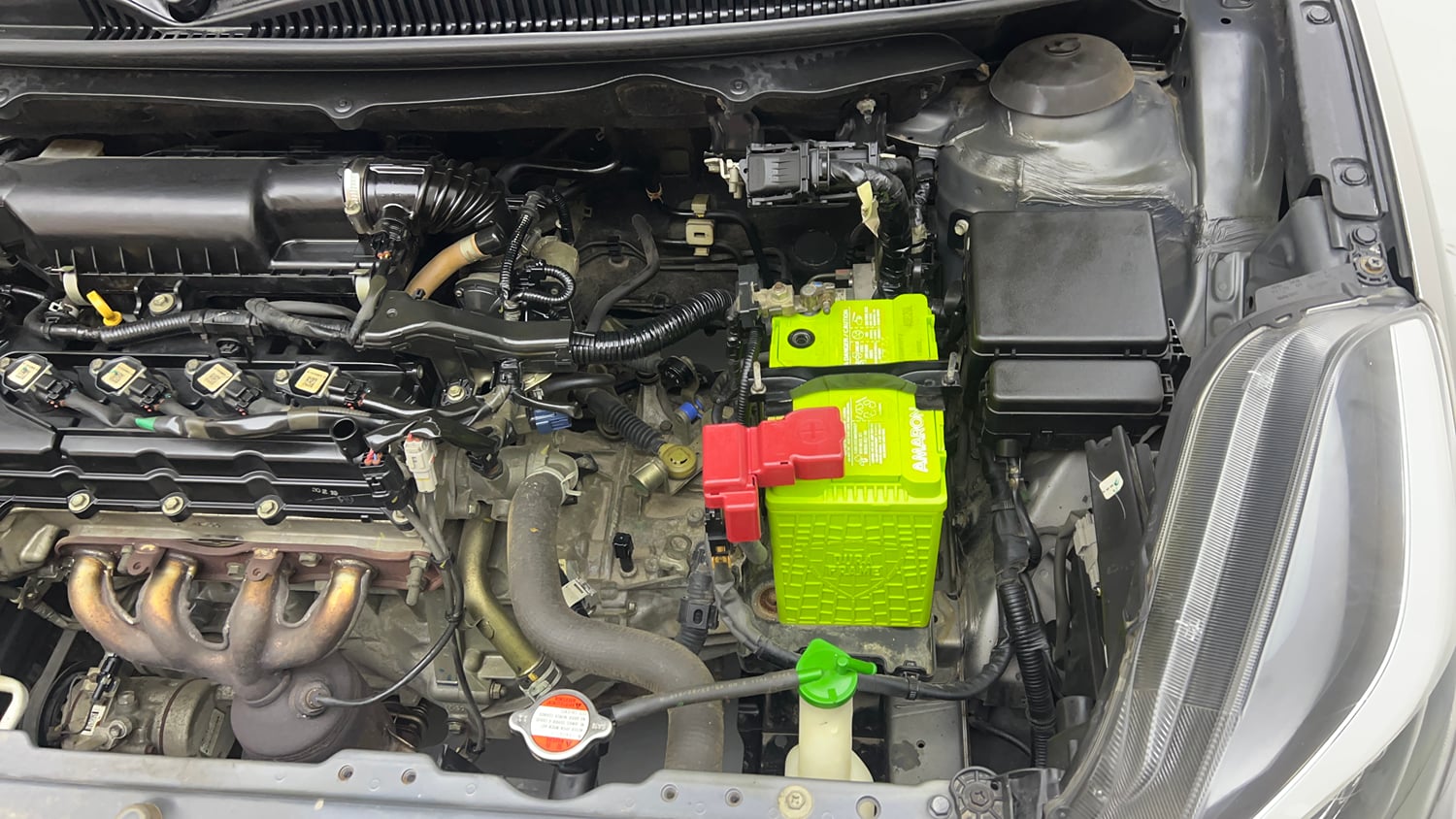 Used 2019 Maruti Suzuki Baleno Delta Petrol Manual engine ENGINE LEFT SIDE VIEW
