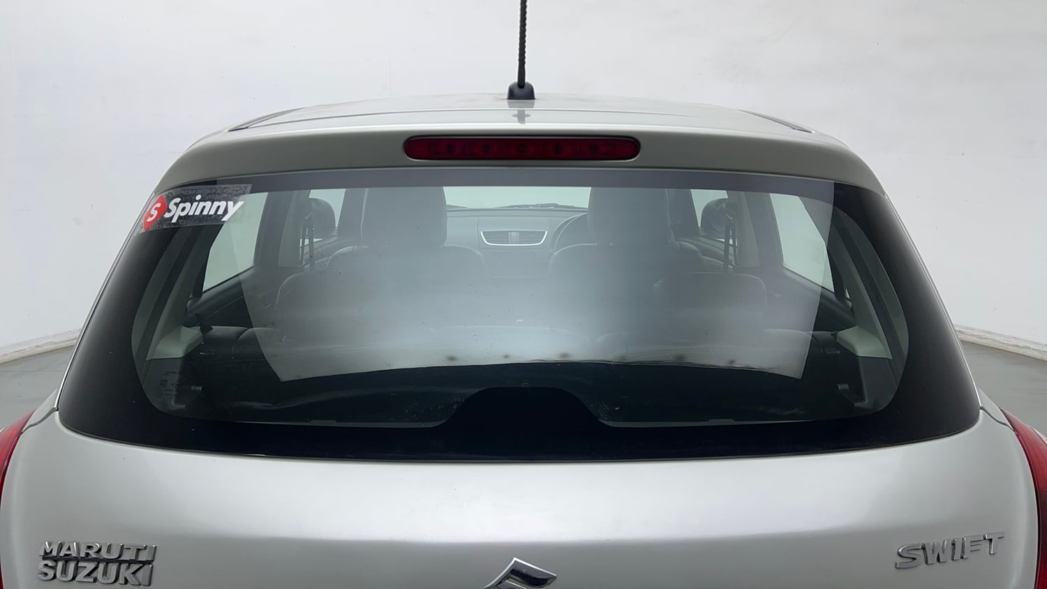 Used 2015 Maruti Suzuki Swift Lxi (O) Petrol Manual exterior BACK WINDSHIELD VIEW