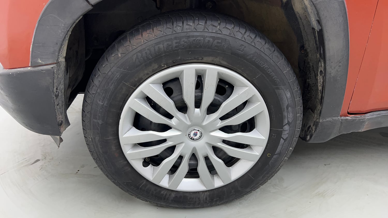 Used 2017 Mahindra KUV100 K4 6 STR Petrol Manual tyres LEFT FRONT TYRE RIM VIEW