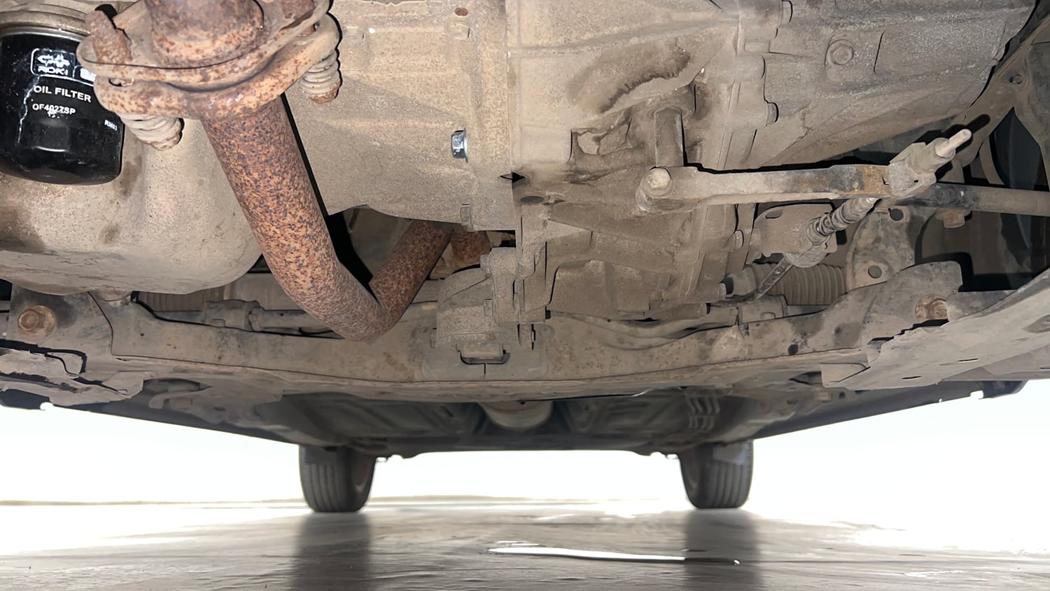 Used 2016 Maruti Suzuki Baleno Zeta 1.2 Petrol Manual extra FRONT LEFT UNDERBODY VIEW