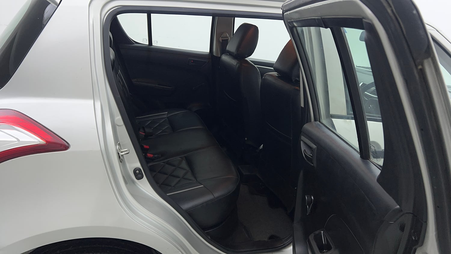 Used 2015 Maruti Suzuki Swift Lxi (O) Petrol Manual interior RIGHT SIDE REAR DOOR CABIN VIEW