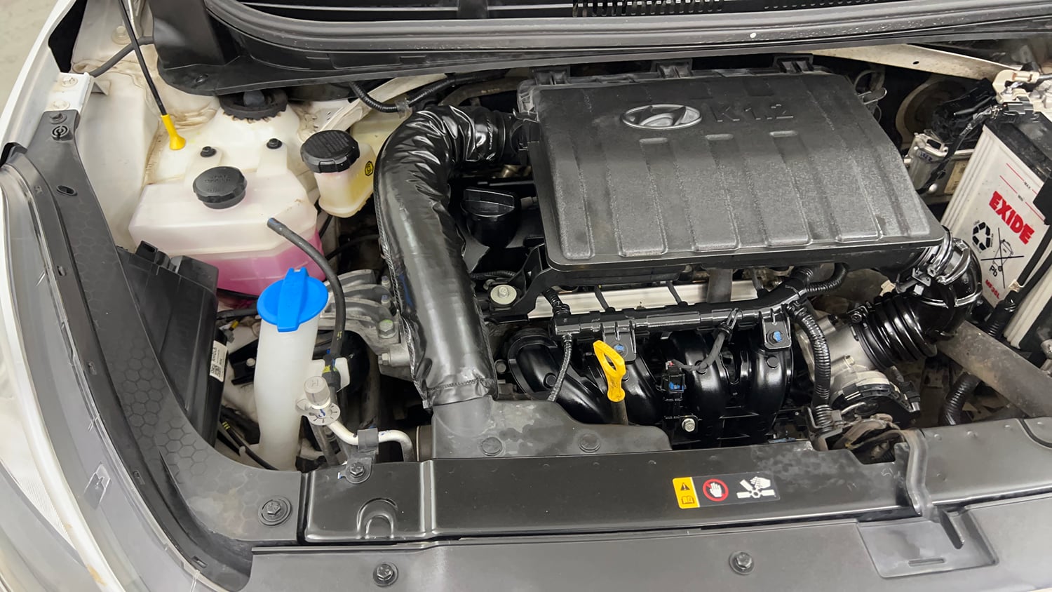 Used 2022 Hyundai Aura S 1.2 AMT Petrol Petrol Automatic engine ENGINE RIGHT SIDE VIEW