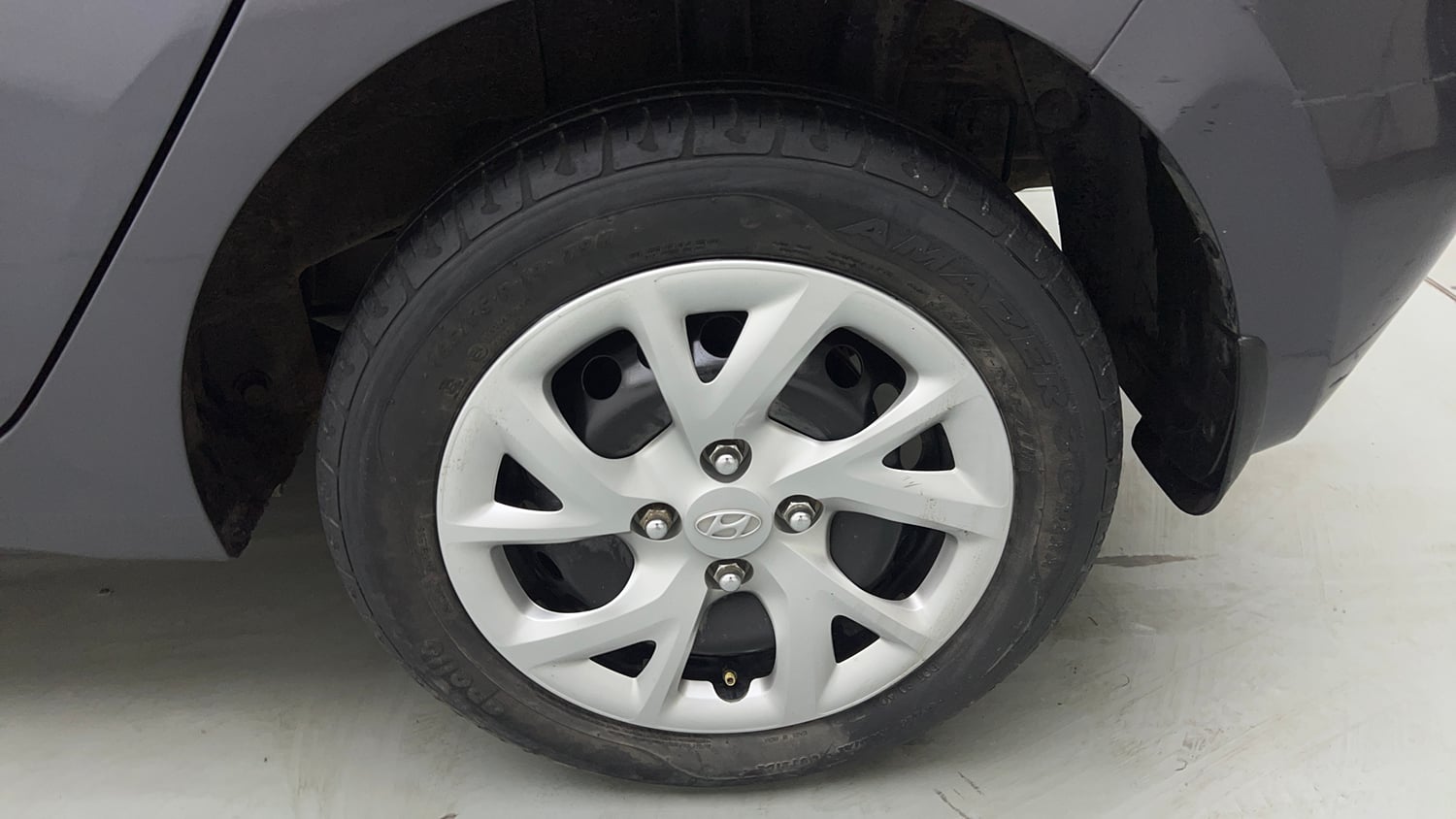 Used 2018 Hyundai Grand i10 Sportz 1.2 Kappa VTVT Petrol Manual tyres LEFT REAR TYRE RIM VIEW