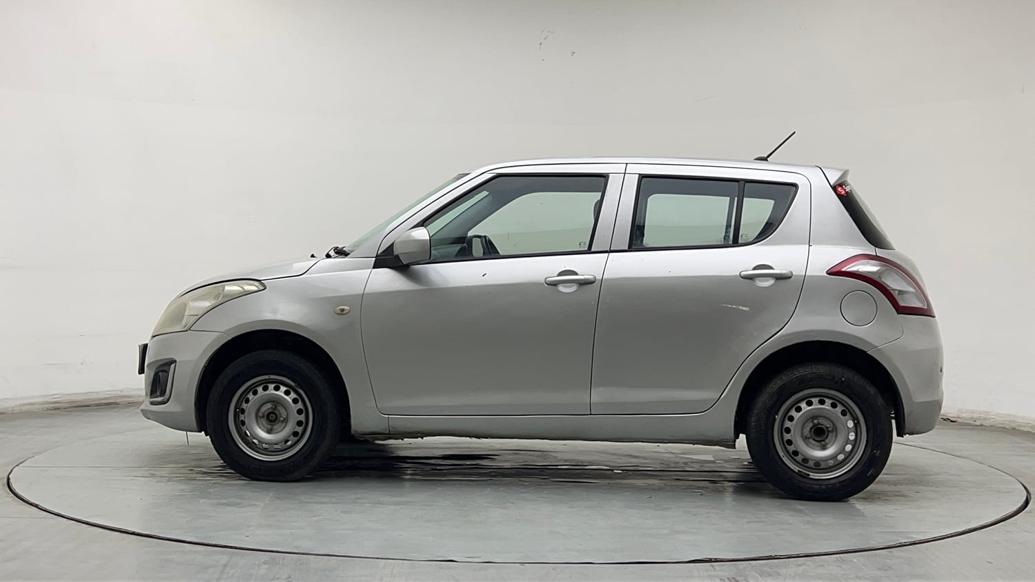 Used 2017 Maruti Suzuki Swift Lxi (O) Petrol Manual exterior LEFT SIDE VIEW