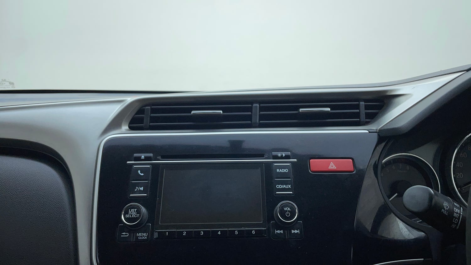 Used 2014 Honda City V Petrol Manual top_features Integrated (in-dash) music system
