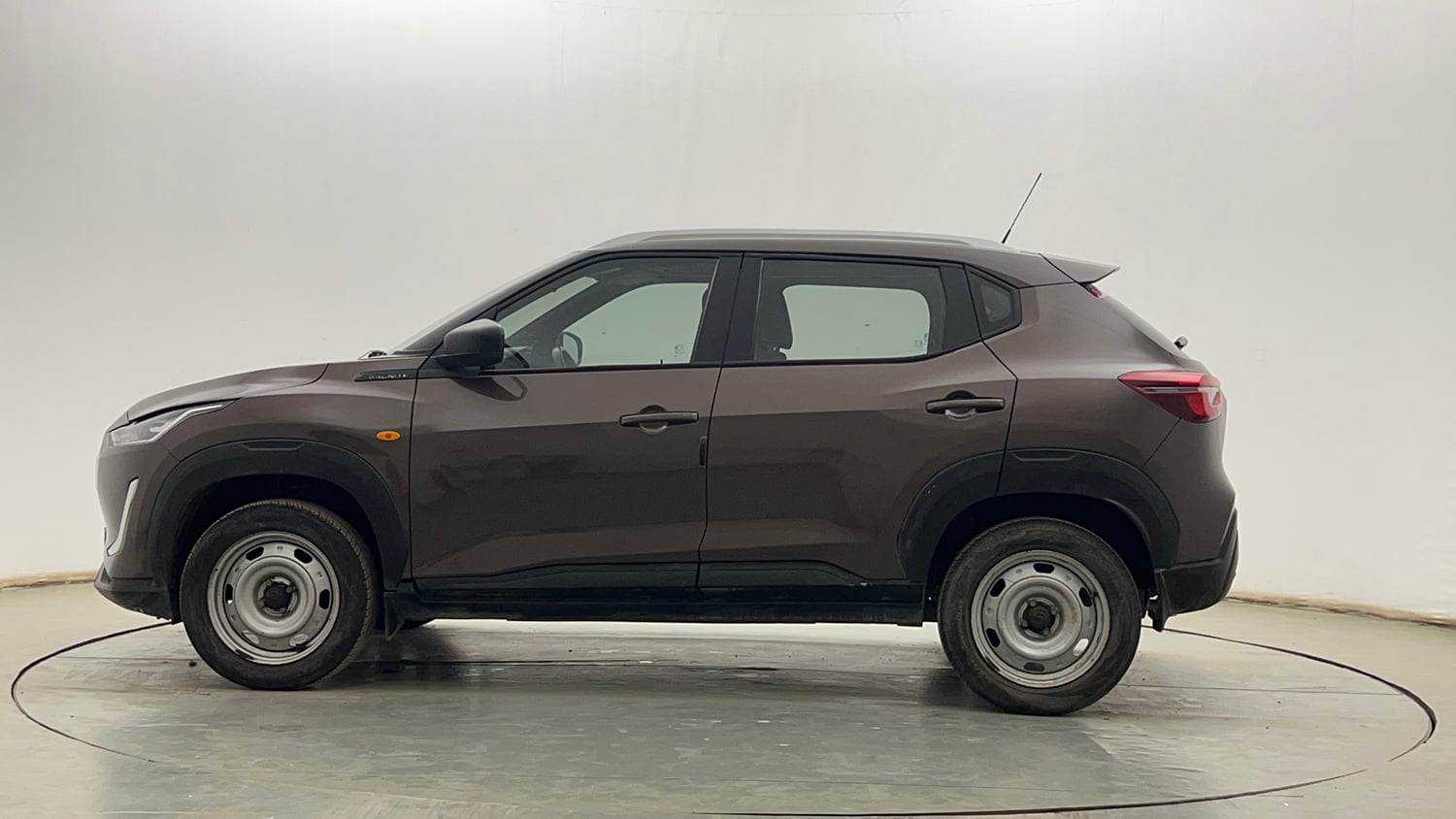 Used 2023 Nissan Magnite XE Petrol Manual exterior LEFT SIDE VIEW