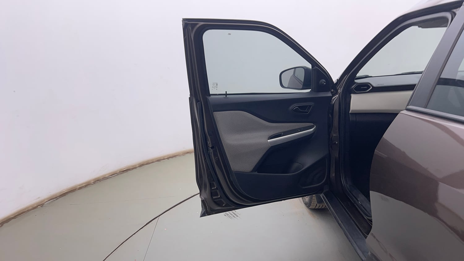 Used 2023 Nissan Magnite XE Petrol Manual interior LEFT FRONT DOOR OPEN VIEW