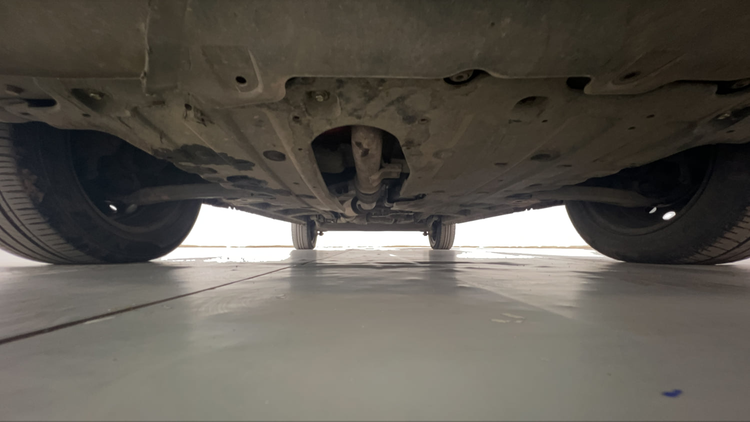 Used 2018 Mahindra KUV100 NXT K6 Plus 6 STR Petrol Manual extra FRONT LEFT UNDERBODY VIEW