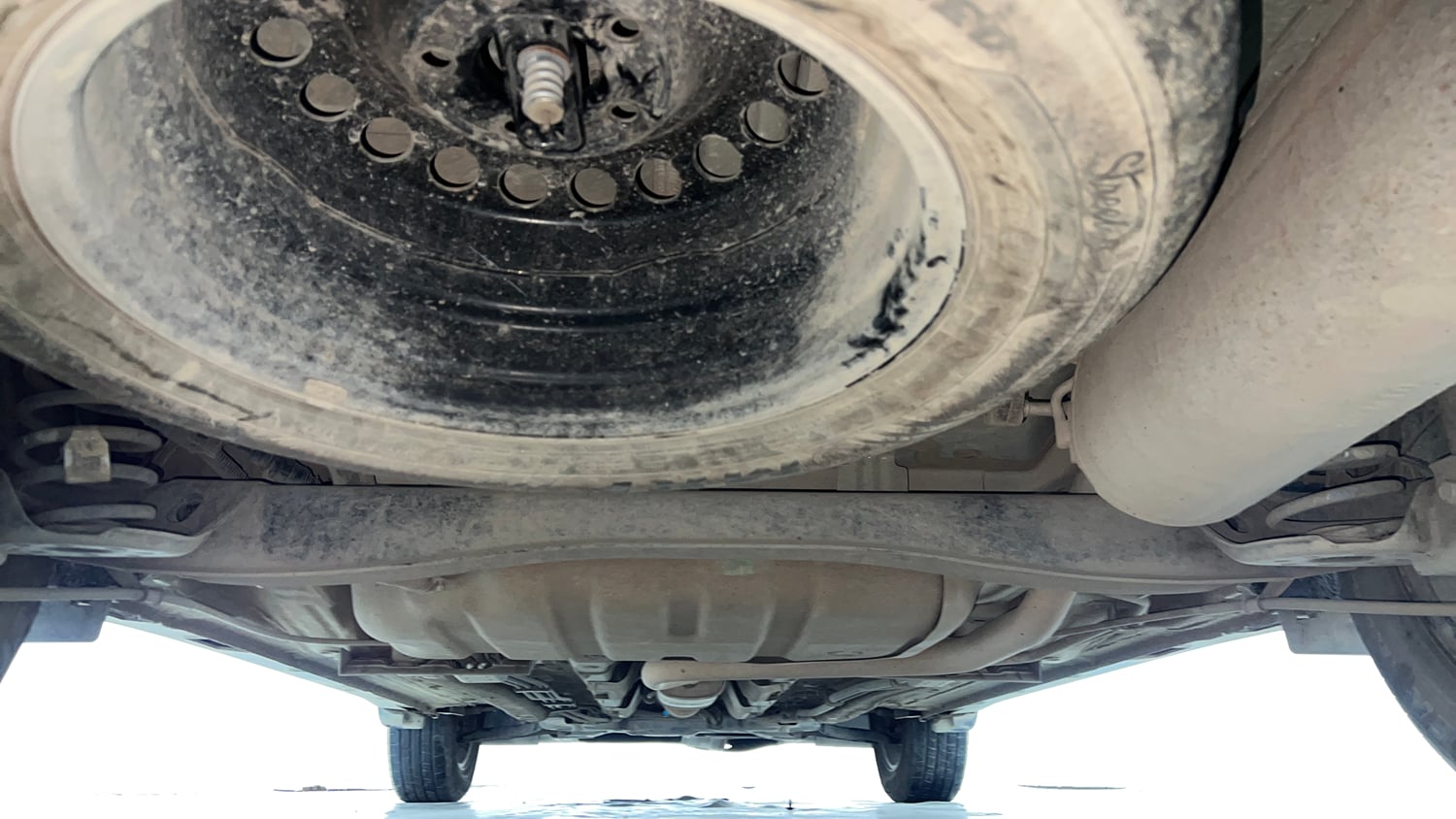 Used 2022 Kia Carens Prestige Plus 1.4 Petrol MT 7 STR Petrol Manual extra REAR UNDERBODY VIEW (TAKEN FROM REAR)