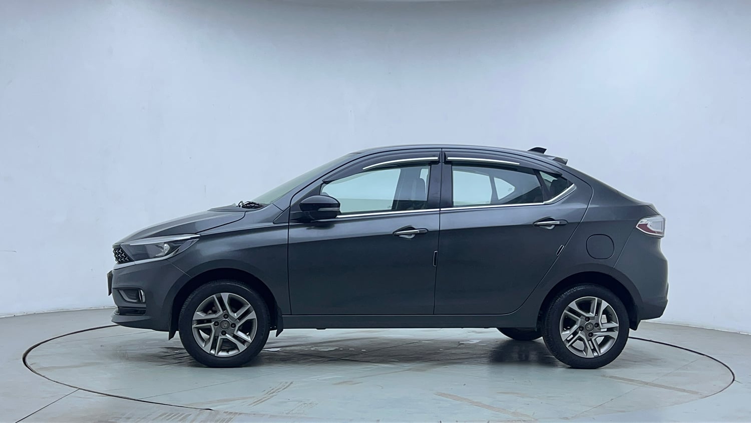 Used 2023 Tata Tigor XZ Plus Petrol Manual exterior LEFT SIDE VIEW