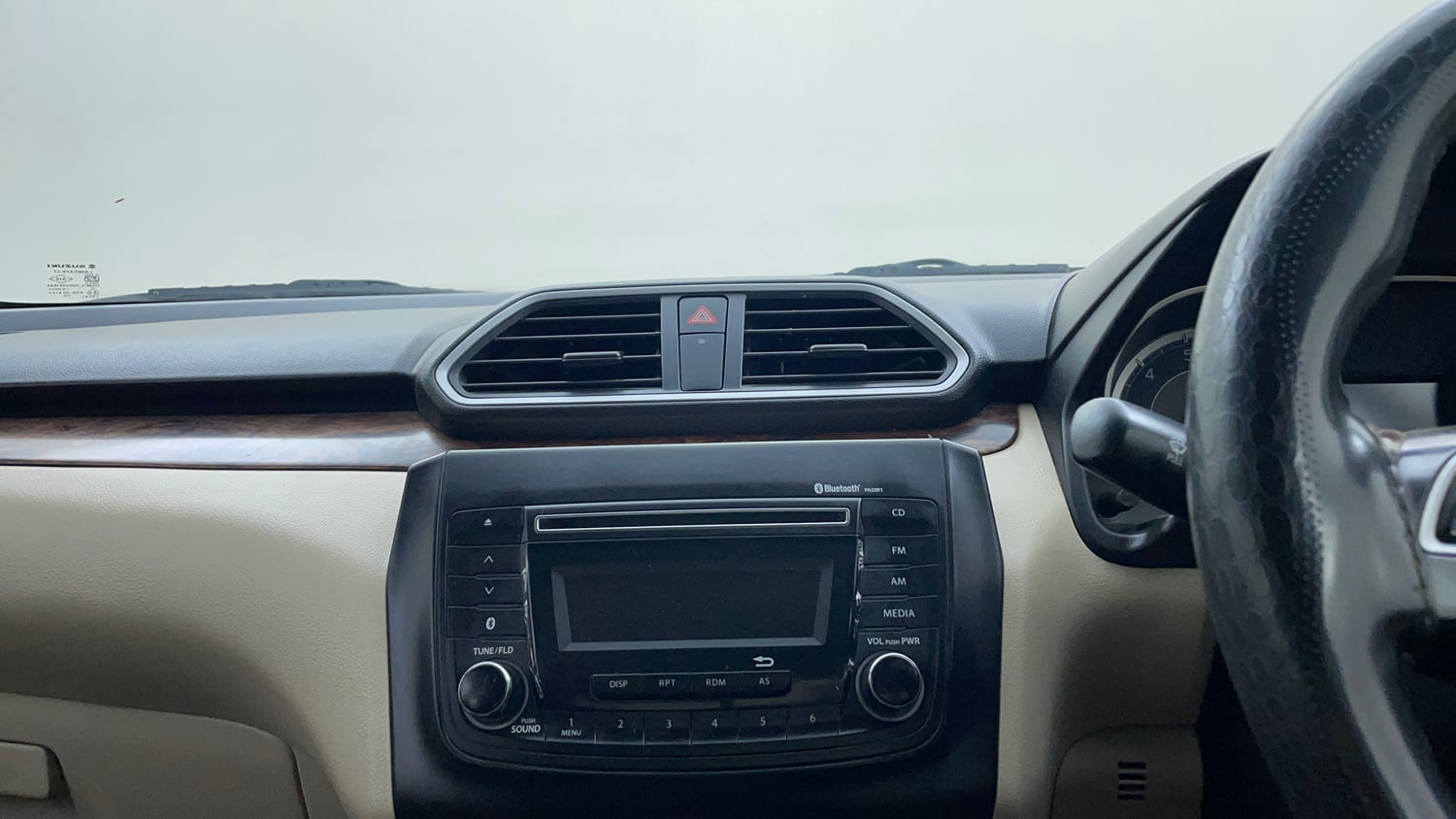 Used 2017 Maruti Suzuki Dzire ZXi AMT Petrol Automatic top_features Integrated (in-dash) music system