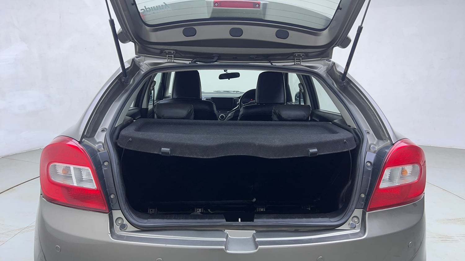 Used 2019 Maruti Suzuki Baleno Delta Petrol Manual interior DICKY DOOR OPEN VIEW