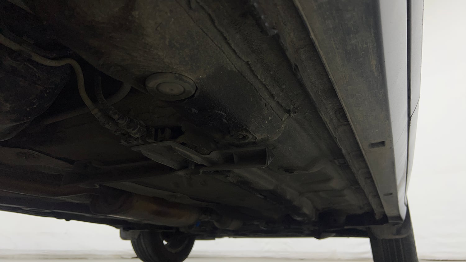 Used 2022 Volkswagen Taigun Highline 1.0 TSI AT Petrol Automatic extra REAR RIGHT UNDERBODY VIEW