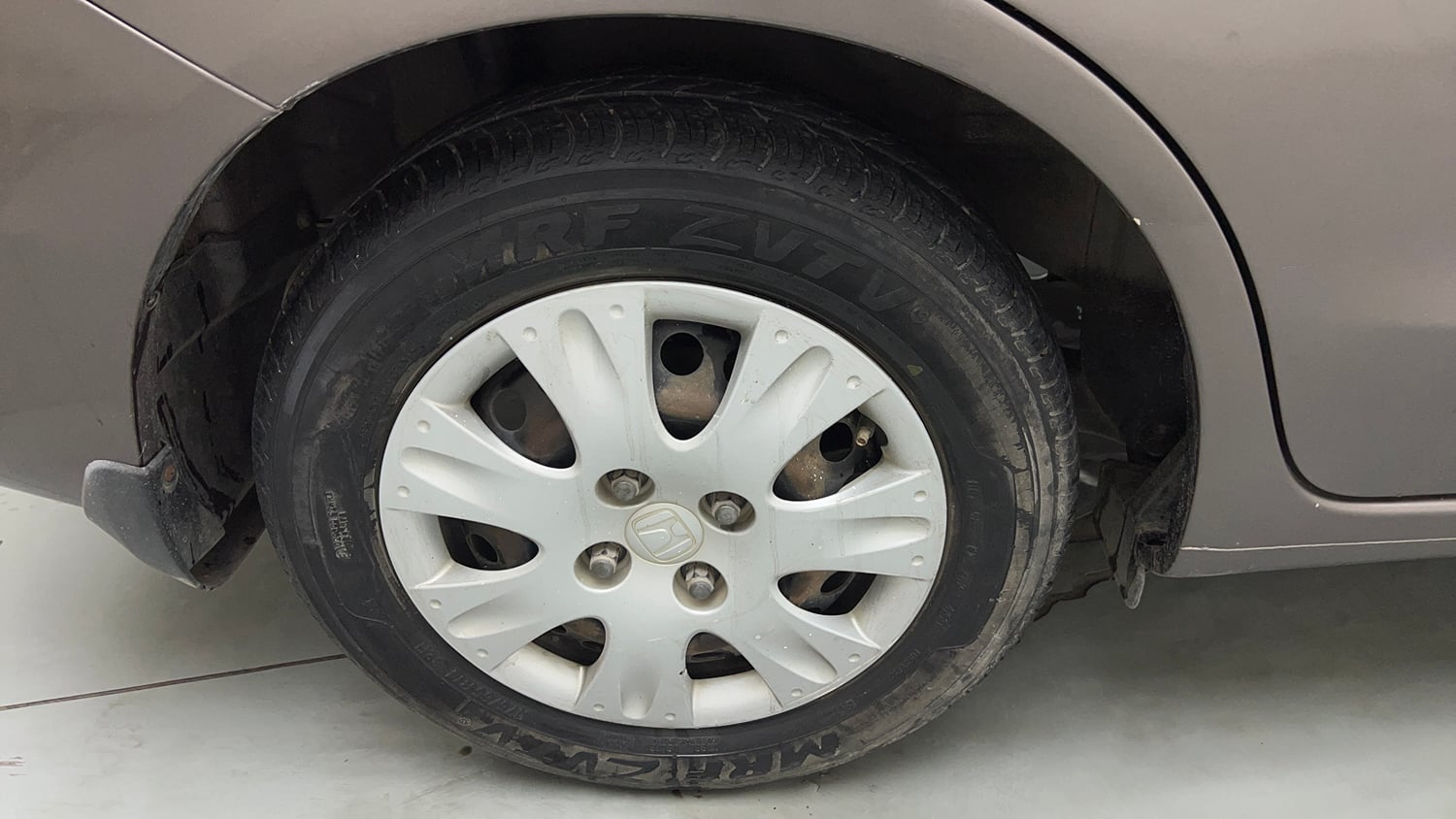 Used 2014 Honda Amaze 1.2 S i-VTEC Petrol Manual tyres RIGHT REAR TYRE RIM VIEW