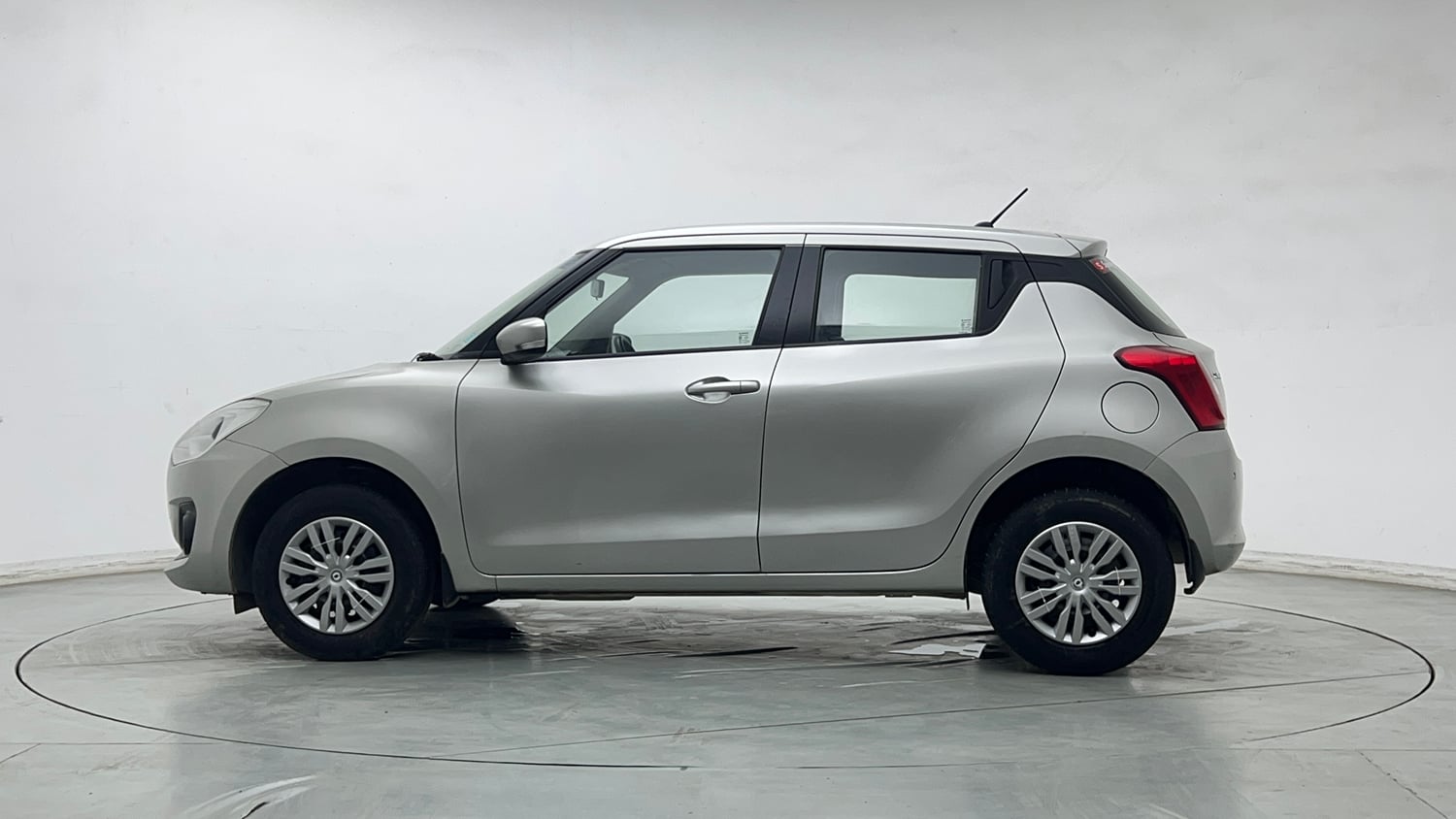 Used 2021 Maruti Suzuki Swift VXi Petrol Manual exterior LEFT SIDE VIEW