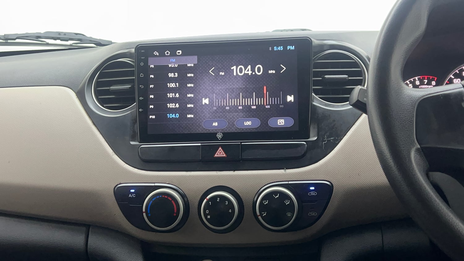Used 2015 Hyundai Grand i10 Sportz 1.2 Kappa VTVT Petrol Manual interior MUSIC SYSTEM & AC CONTROL VIEW