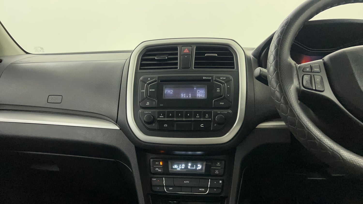 Used 2022 maruti-suzuki Vitara Brezza VXi Petrol Manual interior MUSIC SYSTEM & AC CONTROL VIEW