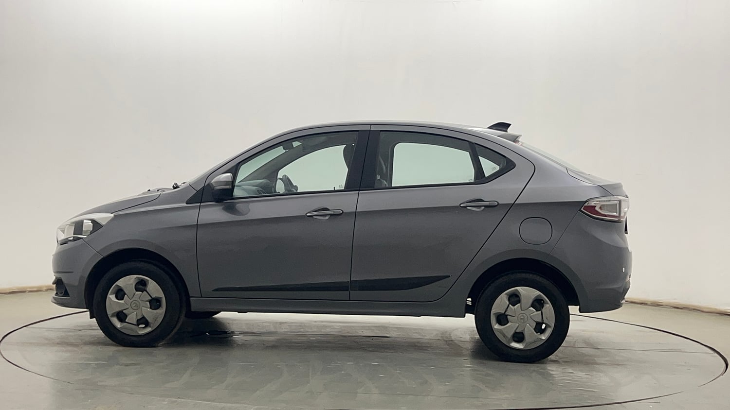 Used 2020 Tata Tigor Revotron XZ Petrol Manual exterior LEFT SIDE VIEW