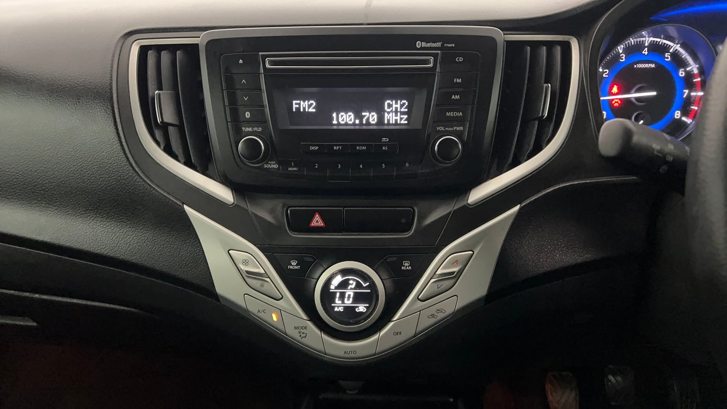 Used 2018 Maruti Suzuki Baleno Zeta 1.2 Petrol Manual interior MUSIC SYSTEM & AC CONTROL VIEW