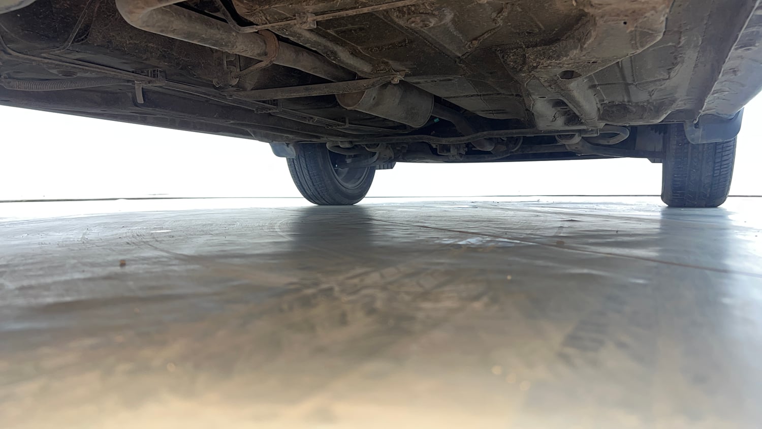 Used 2023 Tata Tigor XZ Plus Petrol Manual extra REAR RIGHT UNDERBODY VIEW