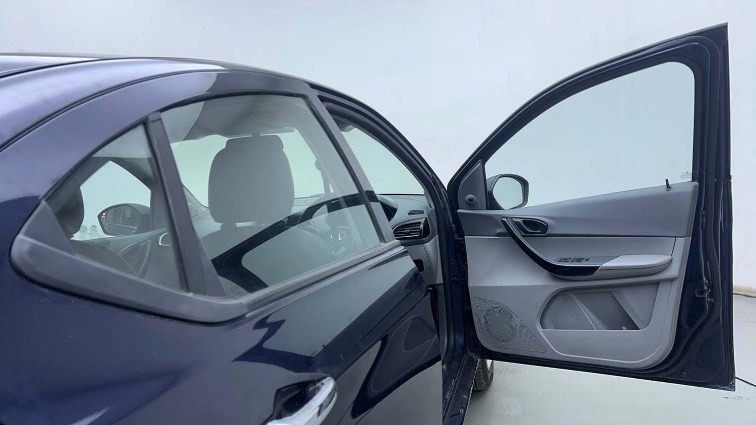 Used 2021 Tata Tigor XM Petrol Manual interior RIGHT FRONT DOOR OPEN VIEW