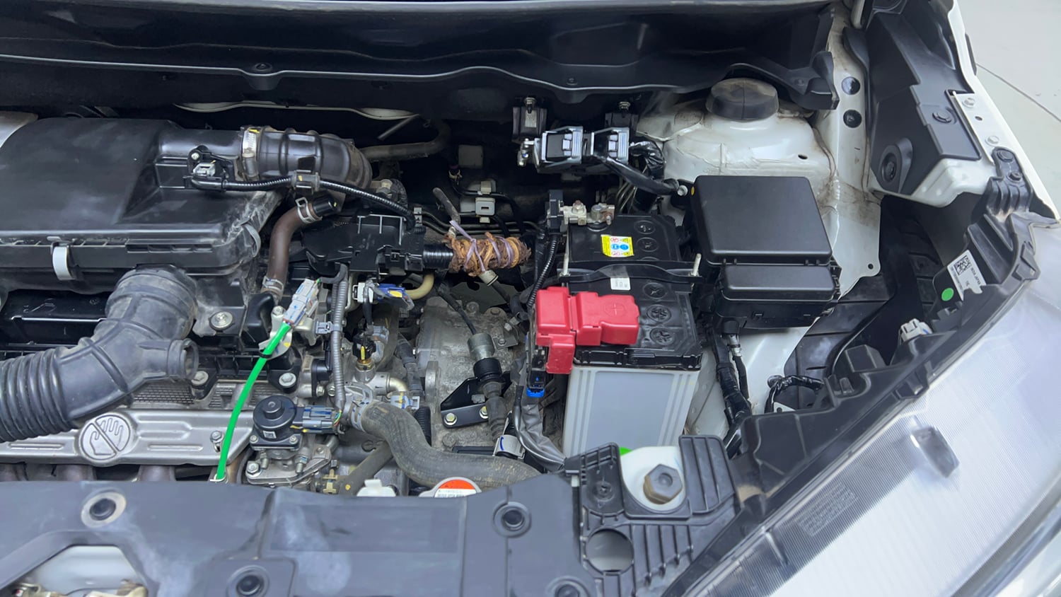 Used 2023 Maruti Suzuki XL6 Zeta AT Petrol Petrol Automatic engine ENGINE LEFT SIDE VIEW