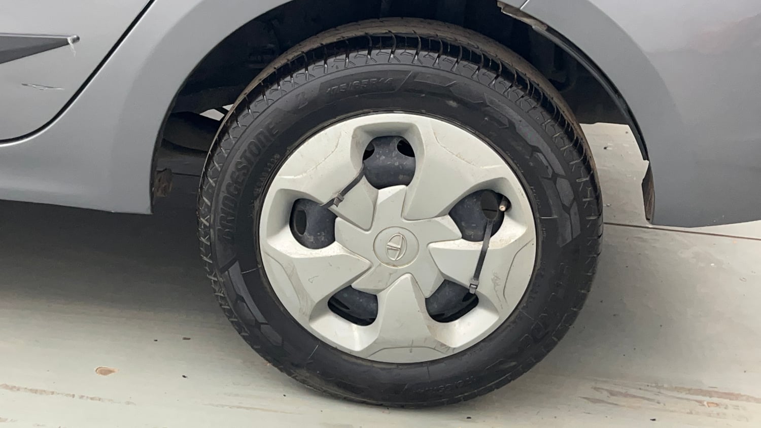 Used 2020 Tata Tigor Revotron XZ Petrol Manual tyres LEFT REAR TYRE RIM VIEW