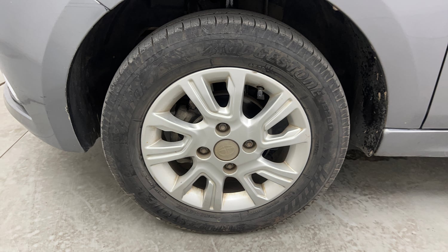 Used 2018 Tata Tiago Revotron XZ Petrol Manual tyres LEFT FRONT TYRE RIM VIEW