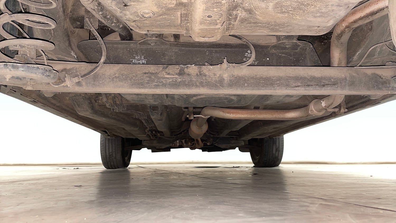 Used 2024 Tata Nexon Fearless Plus S Purple 1.2 Revotron Petrol 7DCA Dual Tone Petrol Automatic extra REAR UNDERBODY VIEW (TAKEN FROM REAR)