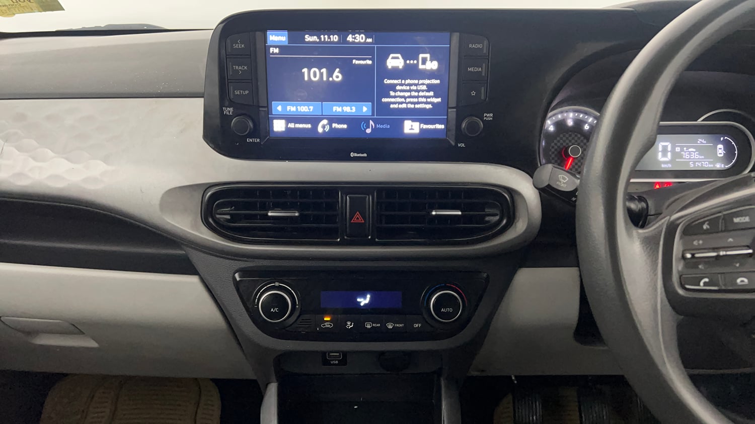 Used 2021 Hyundai Grand i10 Nios Sportz 1.2 Kappa VTVT Petrol Manual interior MUSIC SYSTEM & AC CONTROL VIEW
