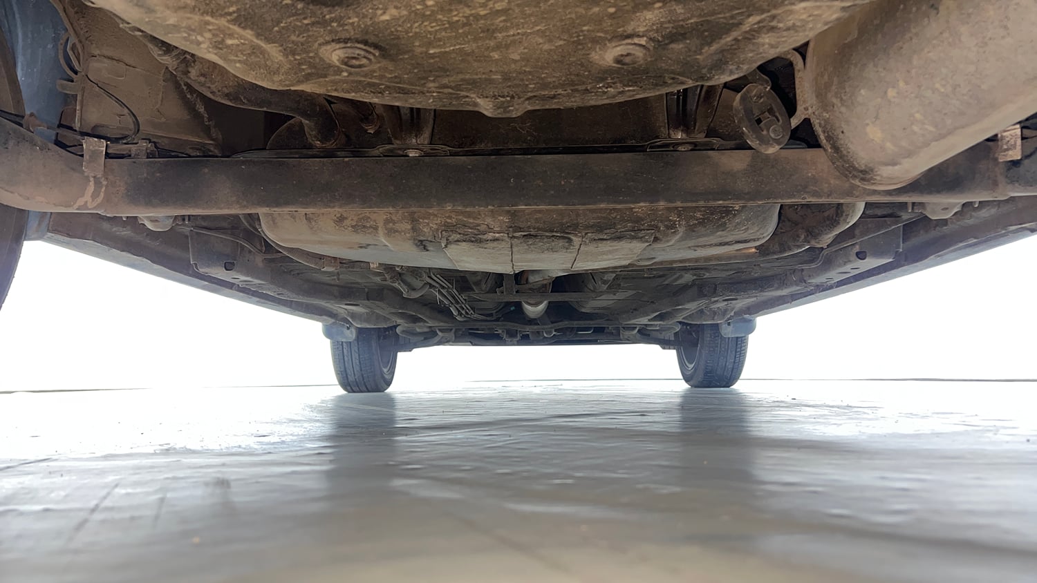 Used 2023 Tata Tigor XZ Plus Petrol Manual extra REAR UNDERBODY VIEW (TAKEN FROM REAR)