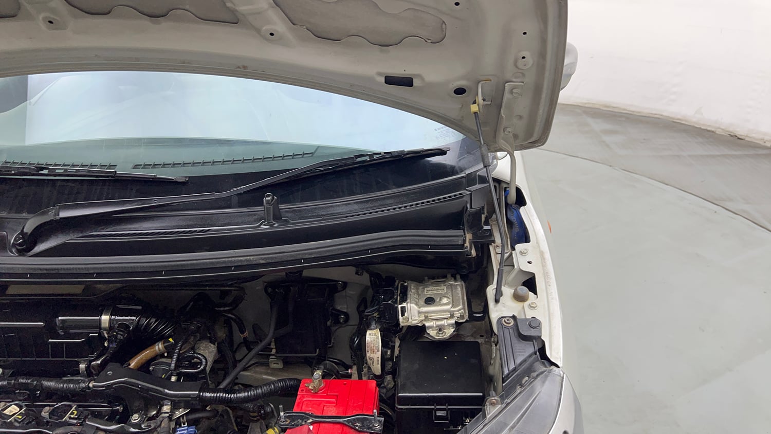 Used 2019 Maruti Suzuki Wagon R VXi 1.2 Petrol Manual engine ENGINE LEFT SIDE HINGE & APRON VIEW
