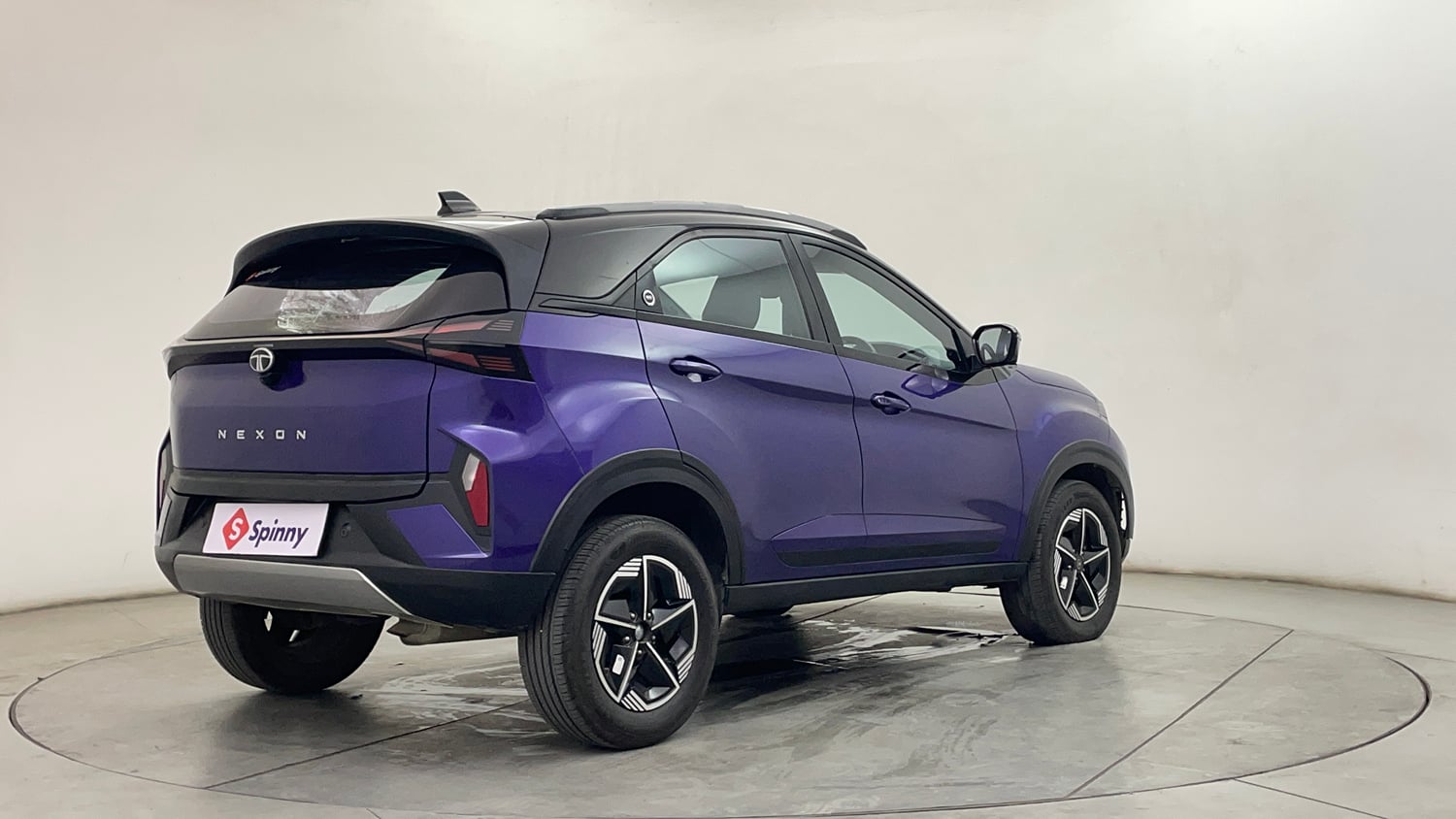 Used 2024 Tata Nexon Fearless Plus S Purple 1.2 Revotron Petrol 7DCA Dual Tone Petrol Automatic exterior RIGHT REAR CORNER VIEW