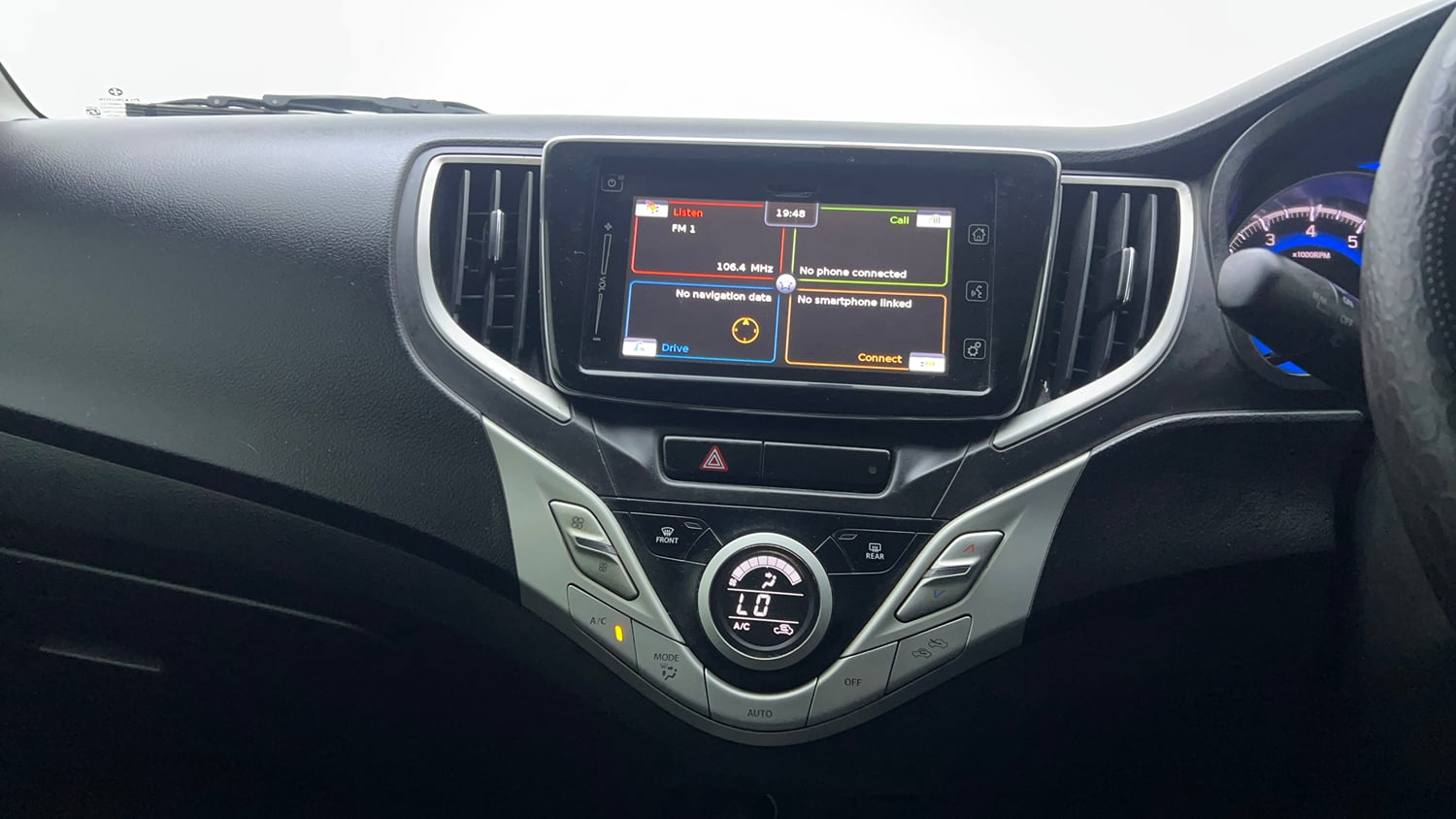 Used 2018 Maruti Suzuki Baleno Alpha 1.2 Petrol Manual top_features Integrated (in-dash) music system