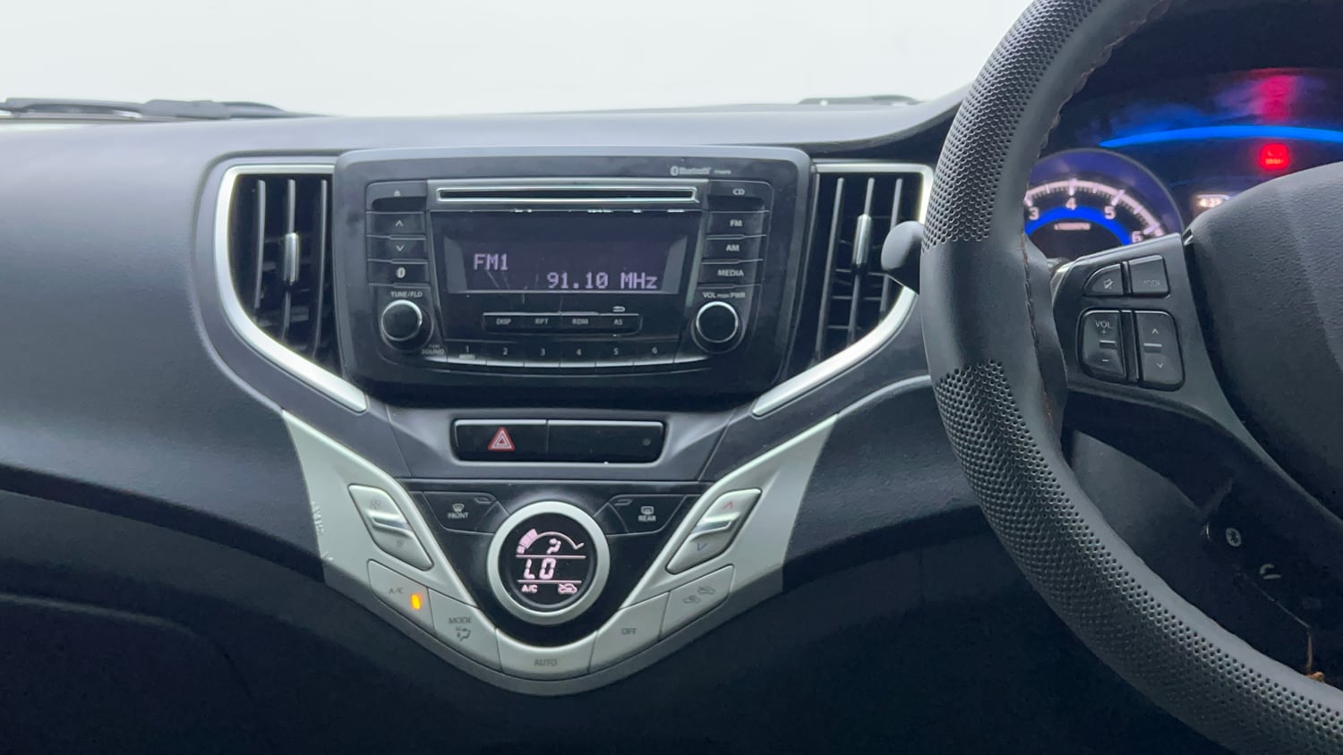 Used 2015 Maruti Suzuki Baleno Zeta 1.2 Petrol Manual interior MUSIC SYSTEM & AC CONTROL VIEW